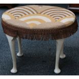 A upholstered dressing stool (with Art Deco fabric).