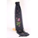 A Victorian fine floral embroidery on a black silk sash.