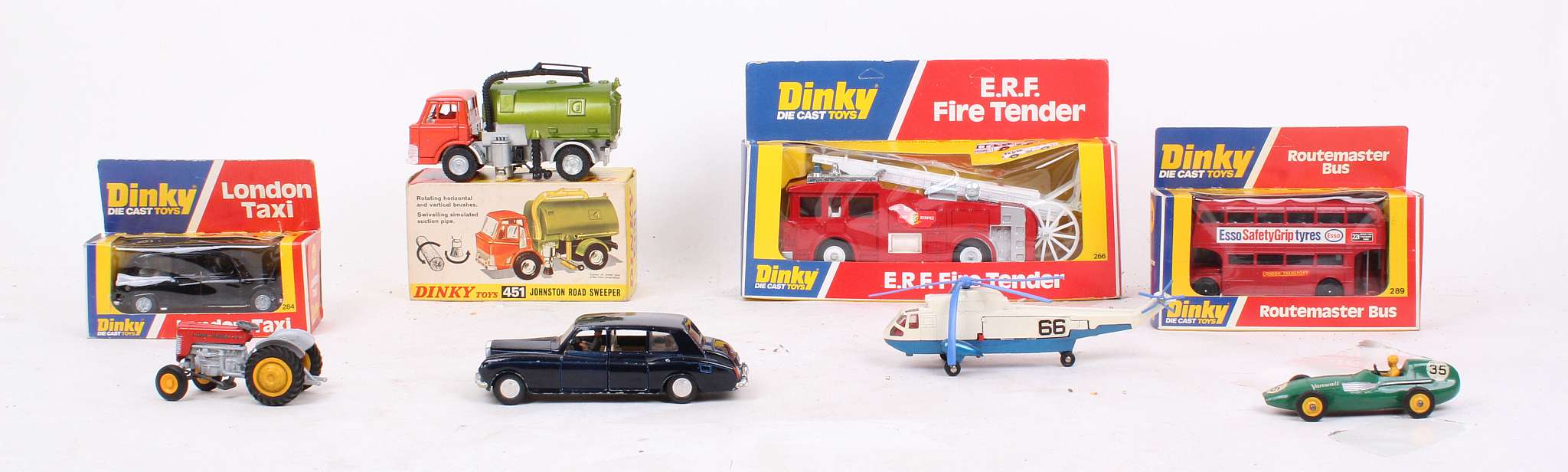 Four Dinky vehicles boxed including 284 London Taxi; 266 ERF Fire Tender; 289 Routemaster bus and