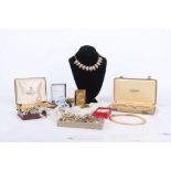 A quantity of good costume jewellery, necklaces, brooches, faux pearls, earrings, with a 9ct gold