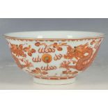 A Chinese bowl, red dragons with green enamel eyes chasing a golden flaming pearl, character stamp