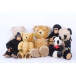 Five vintage Teddy bears and two Deans childs play monkeys, including a clockwork musical Chiltern