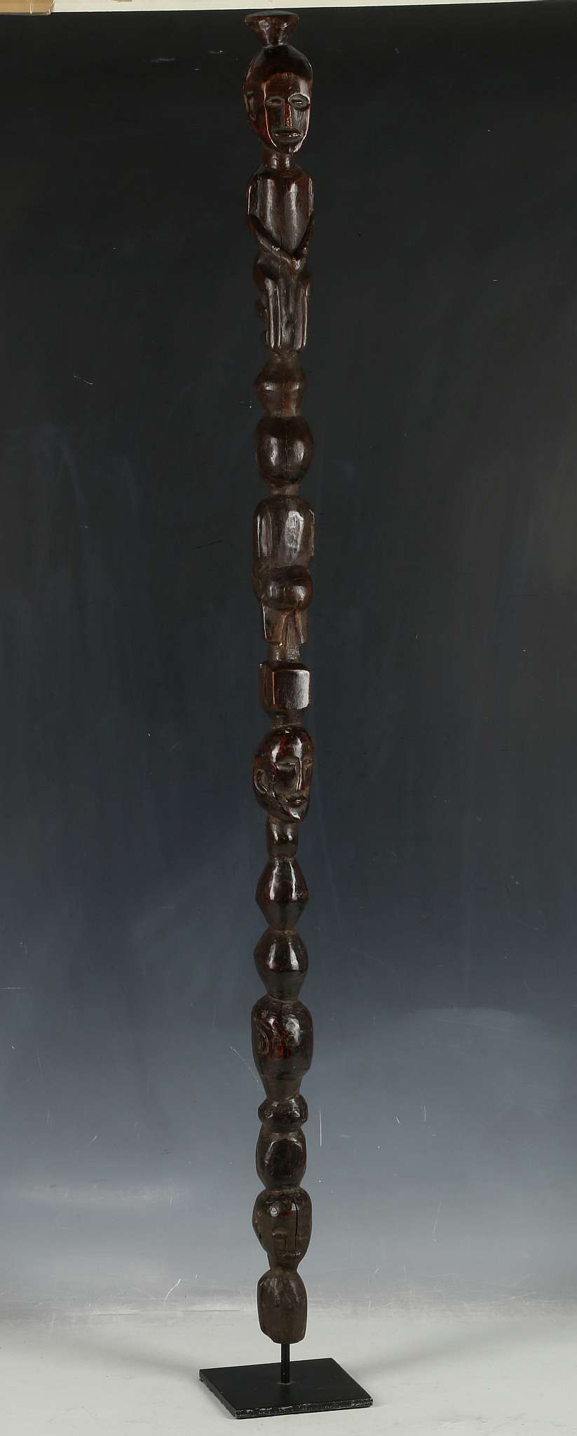 African wooden walking stick from Congo, Lega tribe, male figure above female and other carvings,