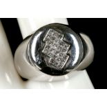 An 18ct white gold and diamond set dress ring.