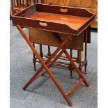 An Edwardian walnut Sutherland table, sold together with a mahogany butler’s tray and stand. (2)