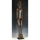 African wooden ancestral figure carving, a rhythm pounder, Senoufo tribe Ivory Coast, 93cm.