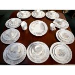 An extensive collection of Royal Worcester dinner and tea ware in "Secret Garden" pattern circa