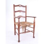 A Victorian  oak wooden child's chair with a three stretcher back, wicker seat, armchair (height
