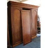 A late 19th/early 20th Century mahogany gentlemen's compactum, linen press configuration of open