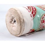 A roll of Harlequin fabric, Olena pattern, sea green ground with floral and abstract roundels, 21.