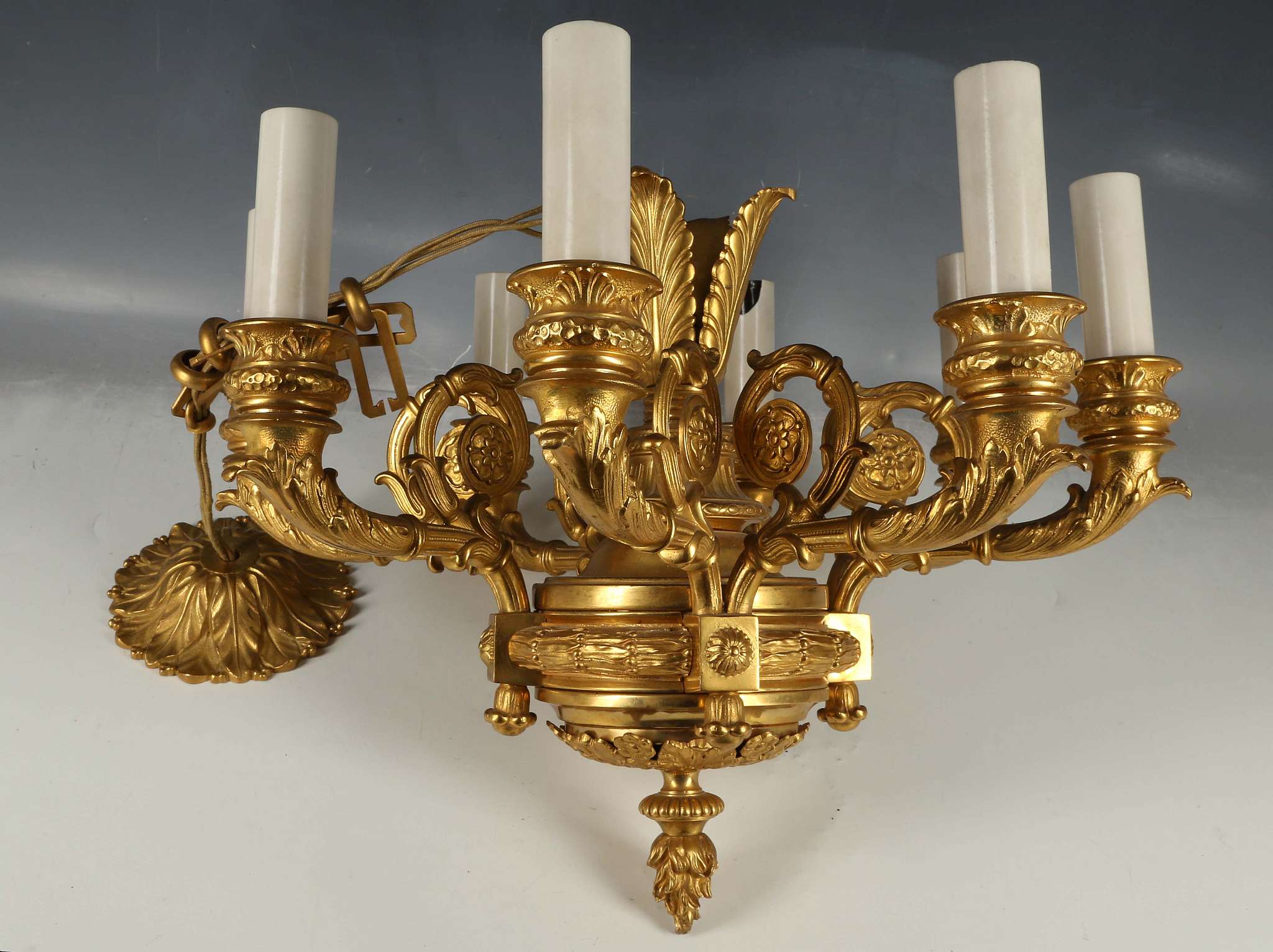 A 19th Century French Empire bronze ormolu hanging lantern having eight scrolling arms, 40cm