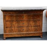 A 19th Century mahogany commode with grey variegated marble top over four long drawers on turned