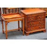 A yew wood butler's tray and stand, and a Georgian style bachelor's chest of drawers of small