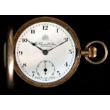 A 9ct gold cased half hunter pocket watch by Thos. Russell & Sons.