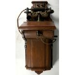 A wall mounted telephone, possibly Ericsson, No. 26 ear piece, press to speak bar to handle,