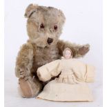 A 1960s Chiltern mohair Teddy, with brown glass eyes, black stitched nose, mouth and claws, cloth