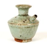 A CHINESE GUAN GLAZED EWER. 
Tang Dynasty. 
11cm H. 
唐代  官窑型开片无耳壶