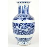 A CHINESE BLUE AND WHITE VASE. 
Late Qing. 
The body with phoenixes decorated among scrolling floral