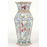 A CHINESE HEXAGONAL SECTION VASE. 
Republican era, apocryphal Daoguang mark to base. 
Decorated in