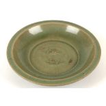 A CHINESE LONGQUAN CELADON TWIN FISH DISH. 
Song. 
With shallow rounded sides rising to a flat