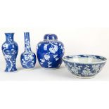 FOUR CHINESE BLUE AND WHITE PRUNUS DECORATED CERAMICS. 
Late Qing, 19th Century. 
Comprising a