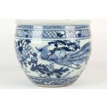 A CHINESE BLUE AND WHITE PHOENIX JARDINIÈRE. 
Qing Dynasty. 
Decorated with phoenixes flying amongst