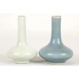 TWO MONOCHROME PEAR SHAPED VASES. 
Kangxi mark to one, but Republican Era. 
With compressed globular