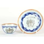 A CHINESE EXPORT ARMORIAL SAUCER AND CUP. 
Qing Dynasty, Qianlong period. 
Each decorated en