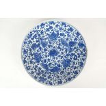 A CHINESE BLUE AND WHITE PLATE. 
Qing Dynasty. 
Decorated with three phoenixes around a peony with