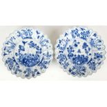 A PAIR OF CHINESE BLUE AND WHITE RIBBED PLATES. 
Qing, 18th Century. 
With foliate edges,