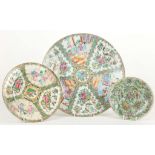 THREE CHINESE CANTON FAMILLE ROSE PLATES. 
19th Century 
Comprising two rose medallion plates, and a