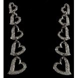 A pair of 18ct white gold and diamond set graduated heart drop earrings.