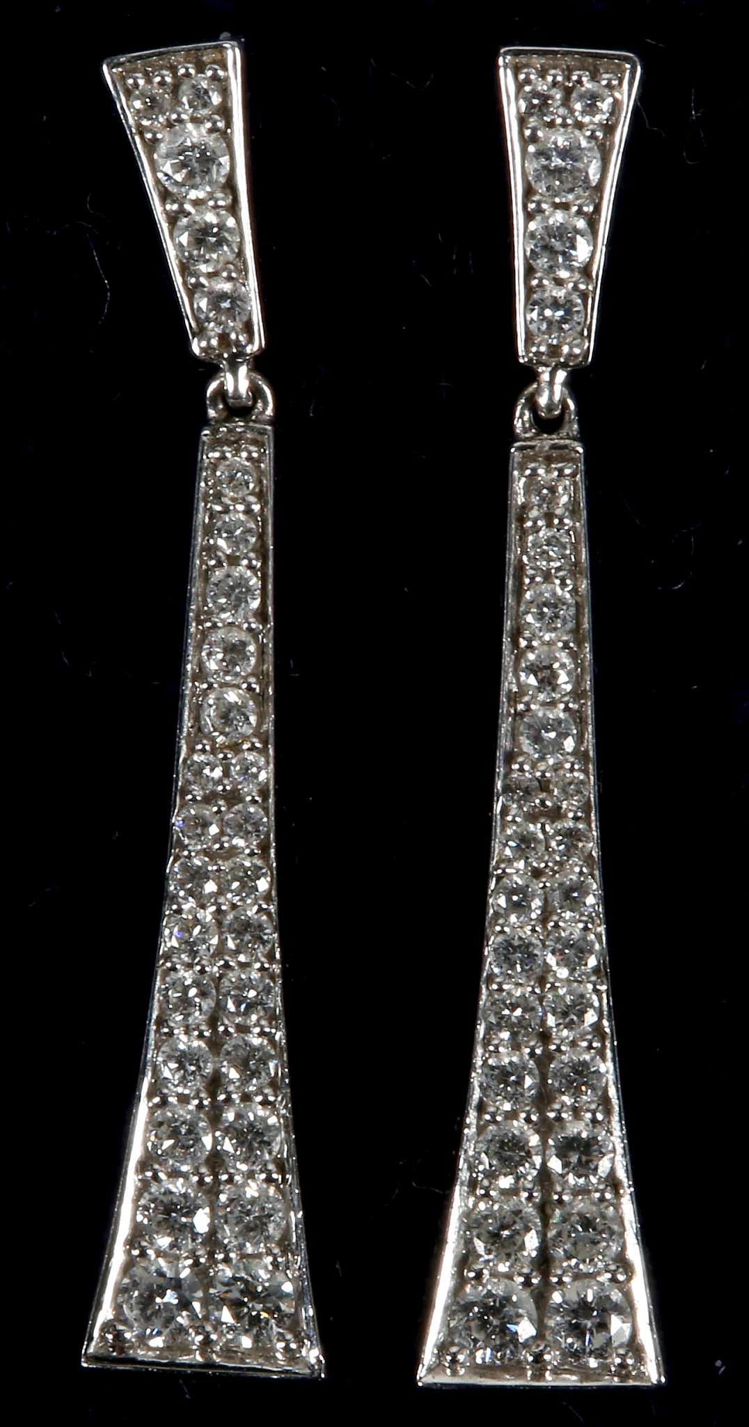 A pair of 18ct white gold and diamond set pendant drop earrings (diamond 0.66ct total). [++1cm top
