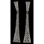 A pair of 18ct white gold and diamond set pendant drop earrings (diamond 0.66ct total). [++1cm top