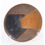 An Italian mid 20th century bronze plate, with geometric overlapping pattern, signed Ese Fedrifalli,
