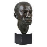 Patricia Finch (British 1921-2001), untitled, 1999, a bronzed male bust on ebonised wooden base,
