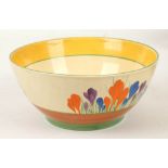 A Clarice Cliff Bizarre Crocus pattern bowl, painted in colours, (22cm diam).