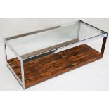 A 1970s Merrow Associates coffee table, glass top with rosewood base and chrome supports, (121 x