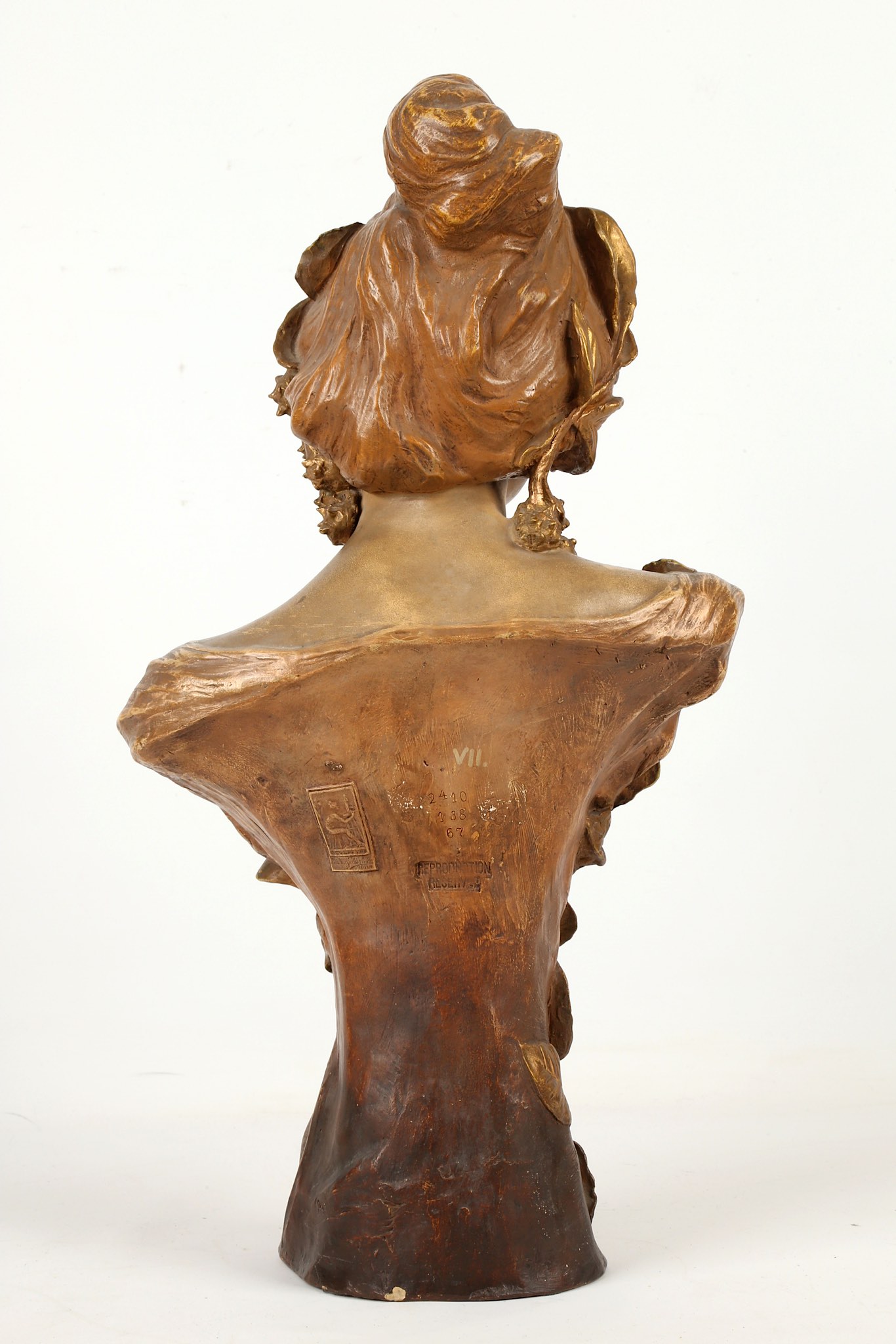 An Austrian Goldscheider bronzed terracotta bust of a neo-classical maiden, circa 1900, stamped - Image 4 of 9