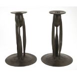 A pair of Liberty & Co. Tudric pewter candlestick designed by Archibald Knox, stamped marks