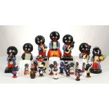 Twelve large Carlton ware ceramic models of 'Golly' characters; musicians, balloon seller, and a