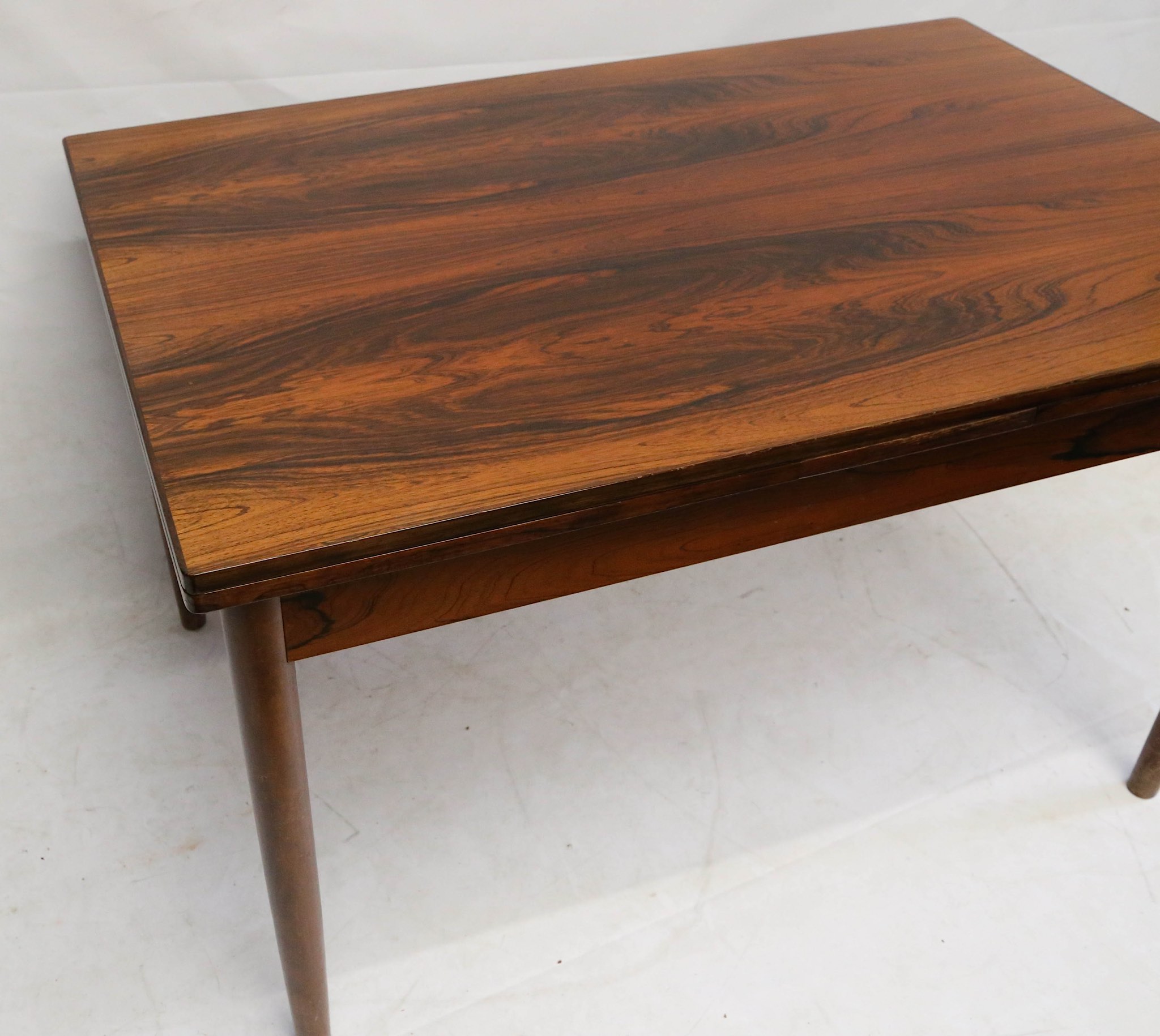 A 1960s Danish rosewood extending dining table, with a pull out leaf at each end, (121 x 80 x 76cm - Image 3 of 4