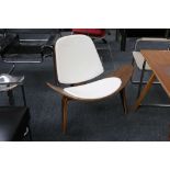 A Hans Wegner style CH07 shell chair, walnut with white leather