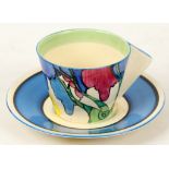 A Clarice Cliff Bizarre 'Rudyard' pattern conical cup and saucer, painted in colour, (cup; 5.5cm