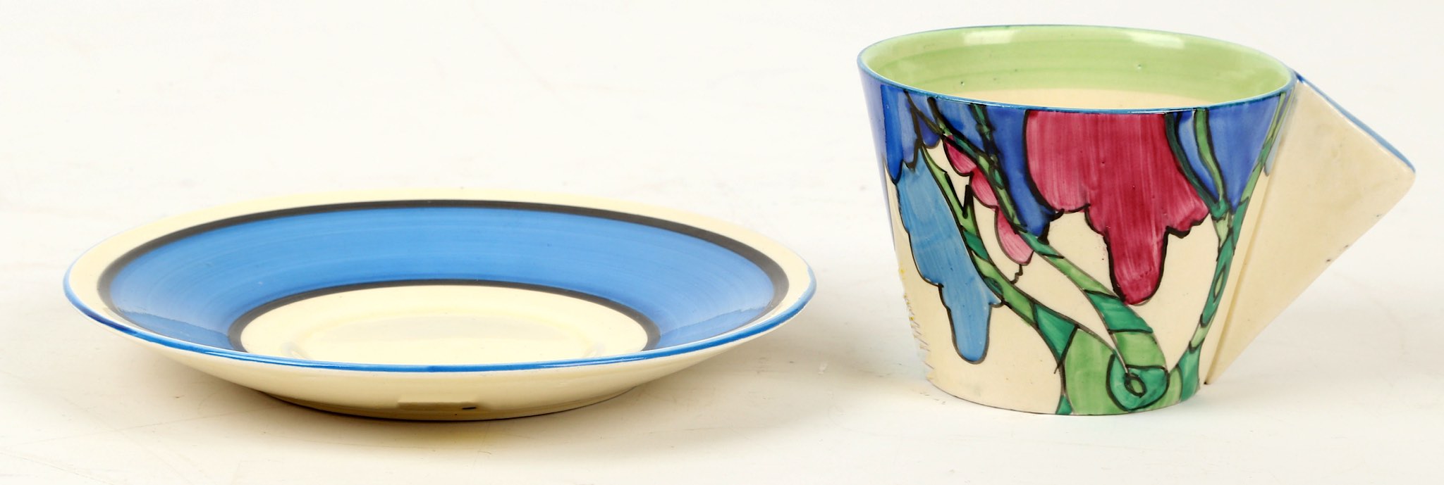 A Clarice Cliff Bizarre 'Rudyard' pattern conical cup and saucer, painted in colour, (cup; 5.5cm - Image 2 of 4