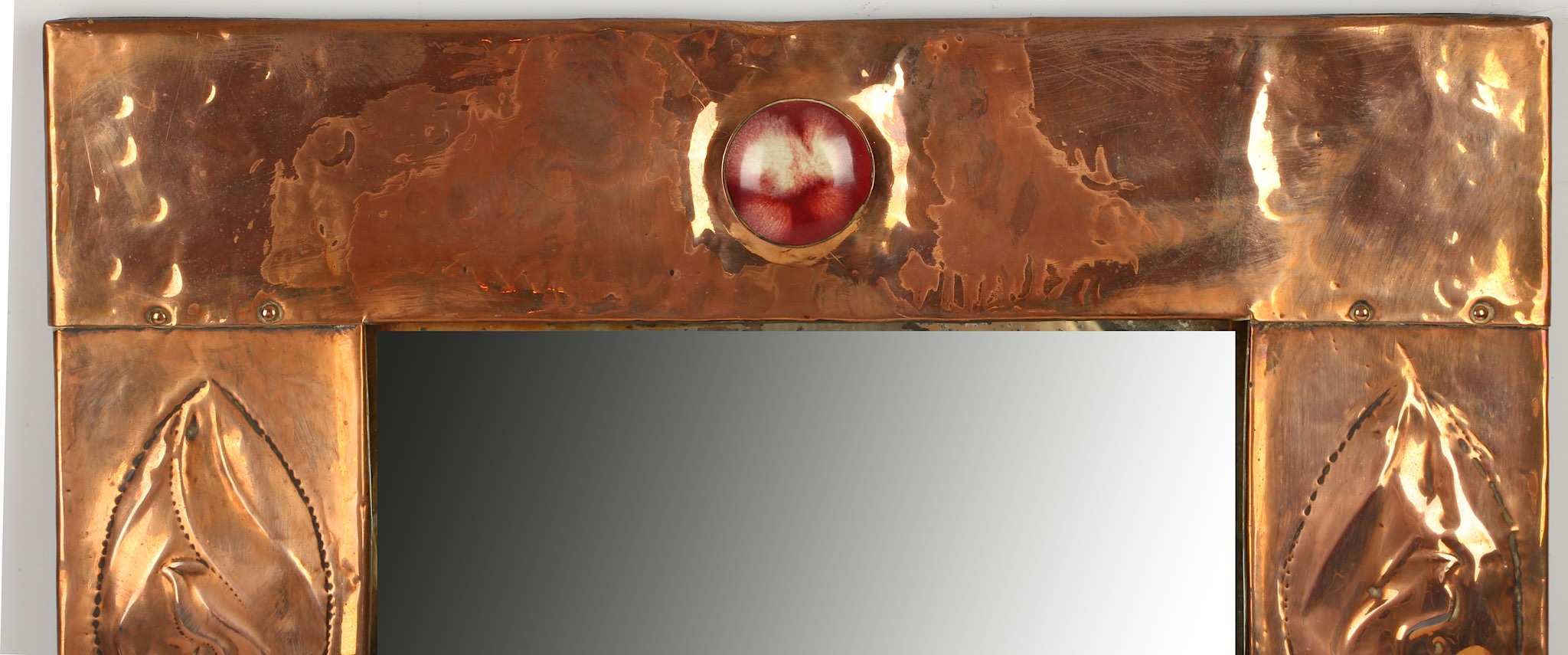 An Art Nouveau mirror with copper embossed frame and Ruskin high fired ceramic cabochon, possibly - Image 5 of 5