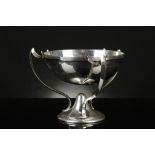 An Henry Matthews Art Nouveau period hallmarked silver pedestal bowl, supported by three arched