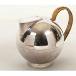 A 1930s silver plated 'Alpaca' decanter, designed by Sylvia Stave for Hallbergs, Sweden, spherical