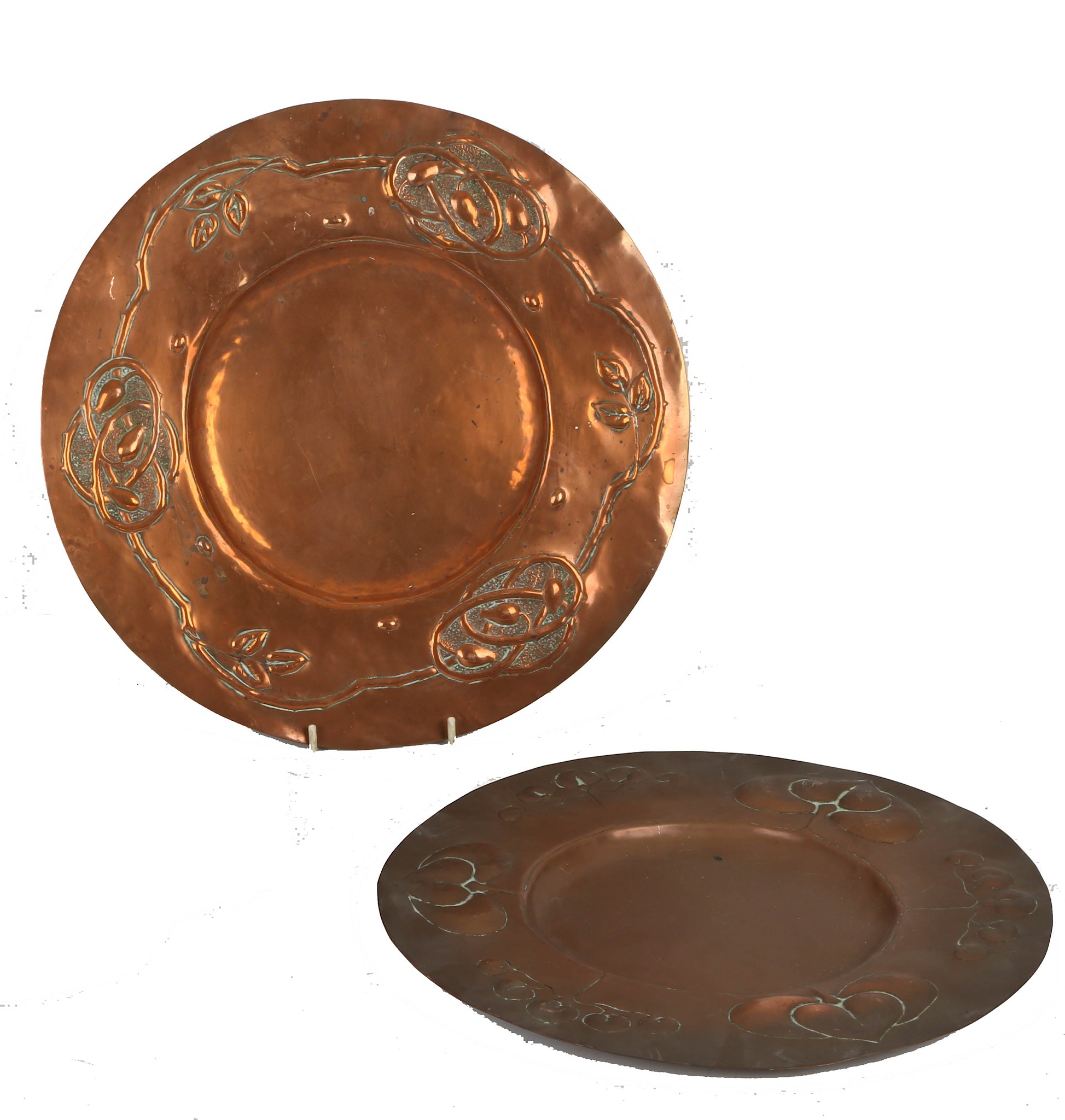 Two Arts and Crafts copper chargers, possibly Birmingham school, (28cm & 30cm diameter).