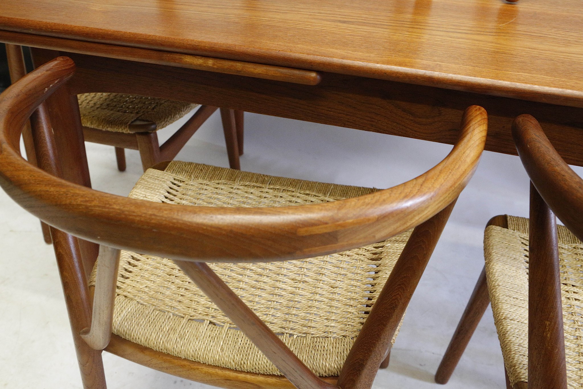 A 1960s Danish teak dining table and six model 225 chairs, designed by Henning Kjaernulf and - Image 2 of 4